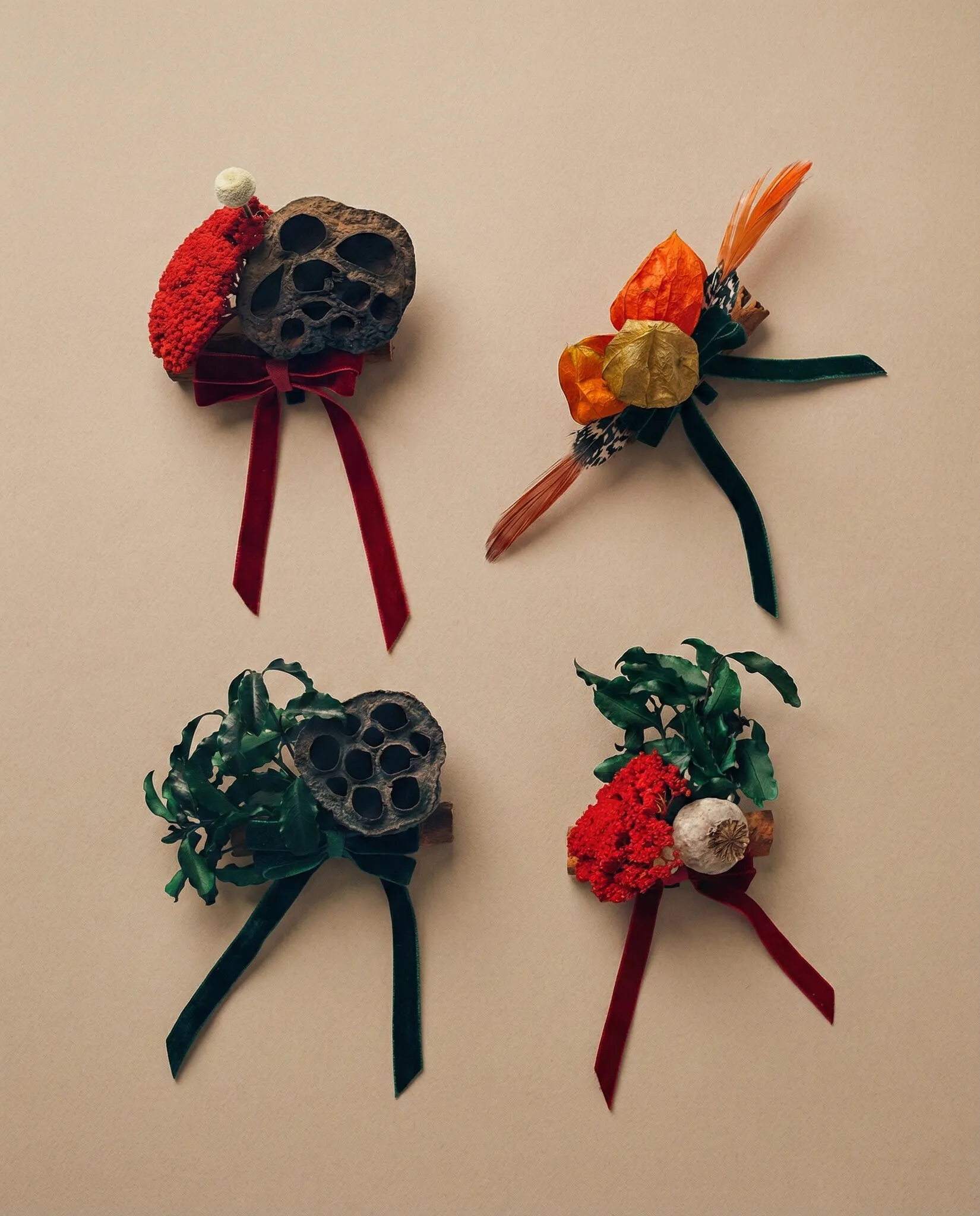 Natural Christmas baubles with lotus pods, physalis lanterns, yarrow and dried botanicals with velvet ribbon handmade in London