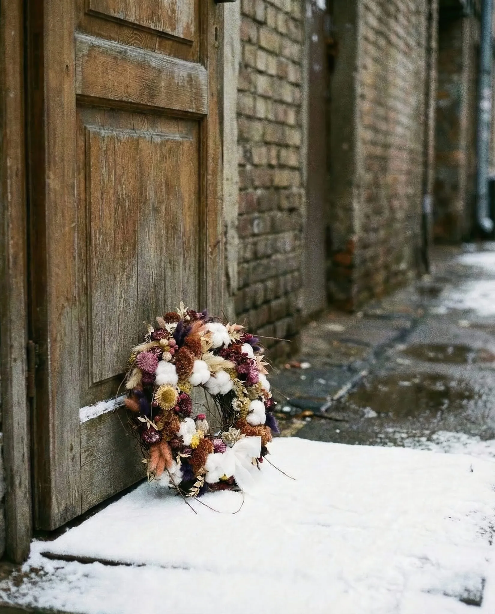 Natural Christmas wreath with cotton flowers and dried florals in rich winter colours handmade in London - image 2