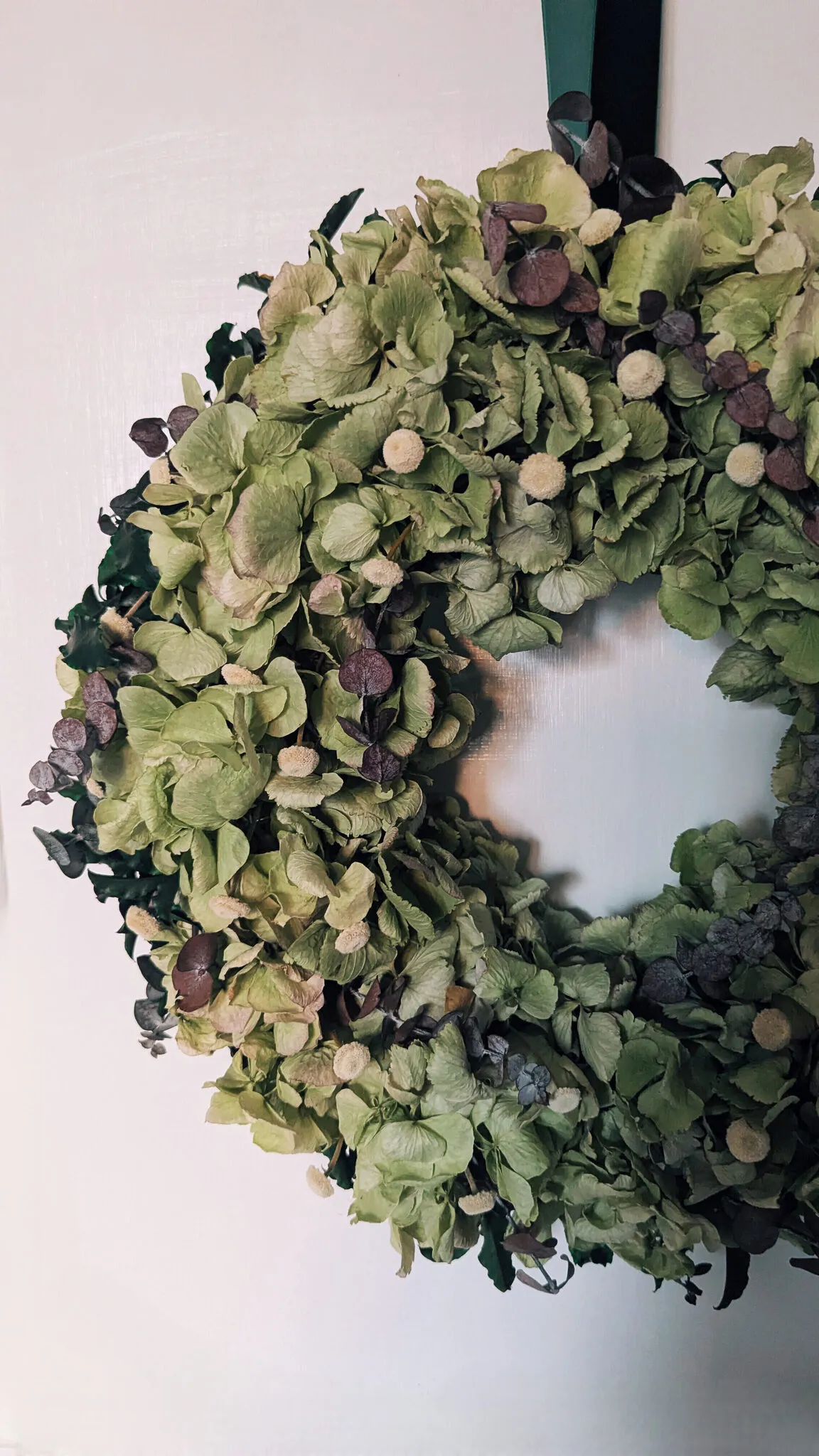 Natural green hydrangea Christmas wreath with eucalyptus and velvet bow handmade in London - image 2